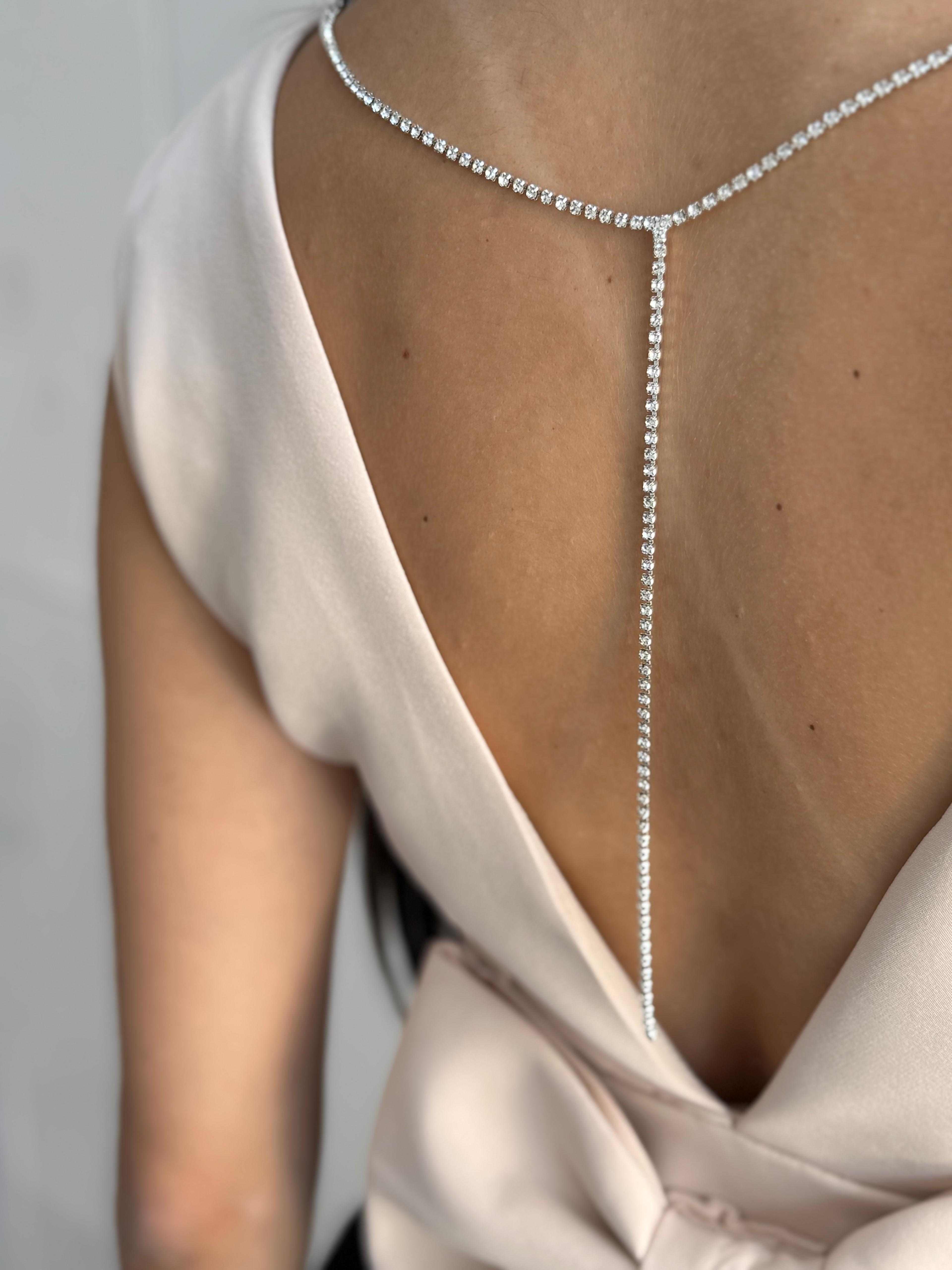 Sleeveless V-Neck Blouse with Back Bow and Chain Detail